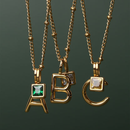 Collar con dije de inicial y piedra de nacimiento